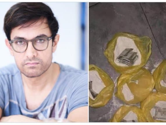 هل وزع الممثل الهندي عامر خان مبالغ مالية على الفقراء داخل أكياس طحين؟